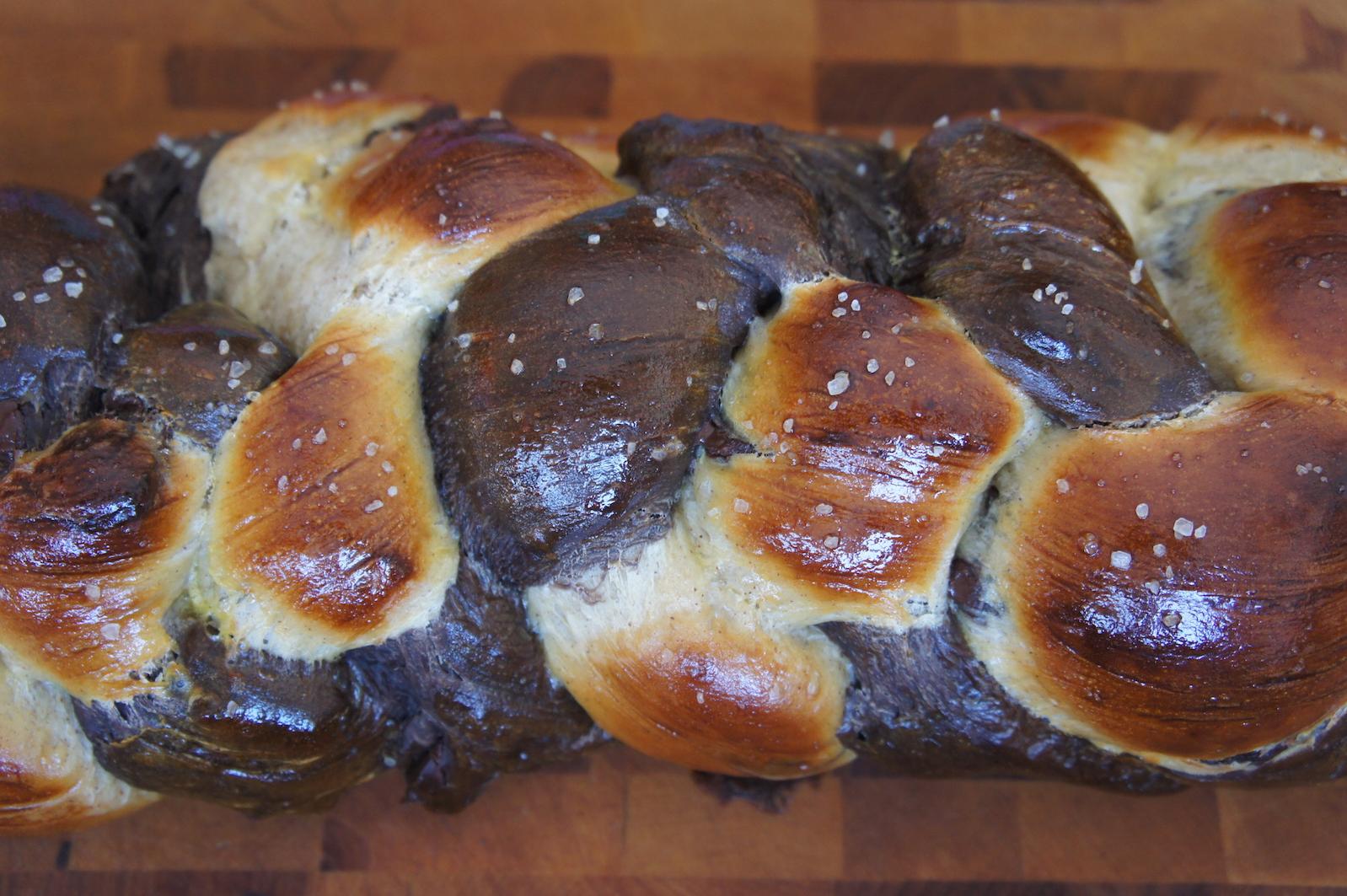  A beautiful braided chocolate chip challah ready to be sliced and enjoyed.