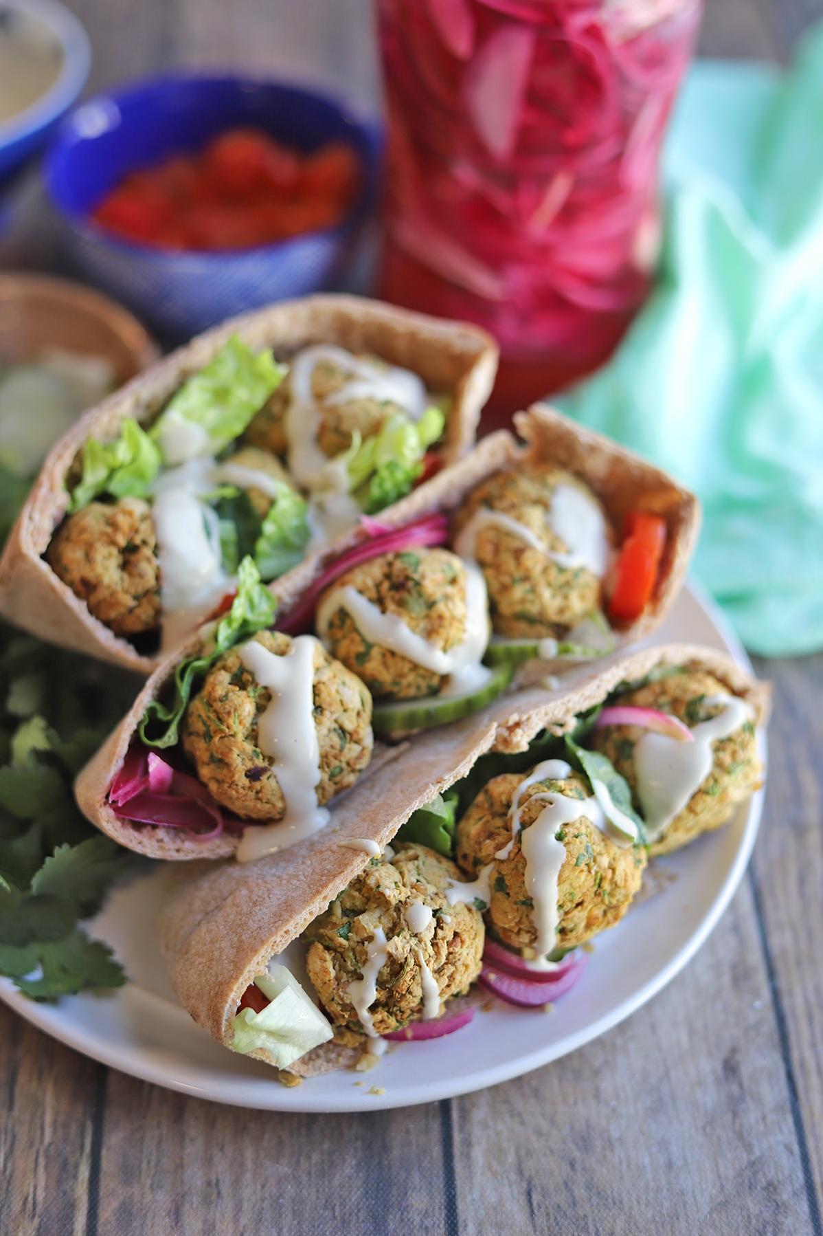  A colorful plate filled with falafel that are packed with flavor.