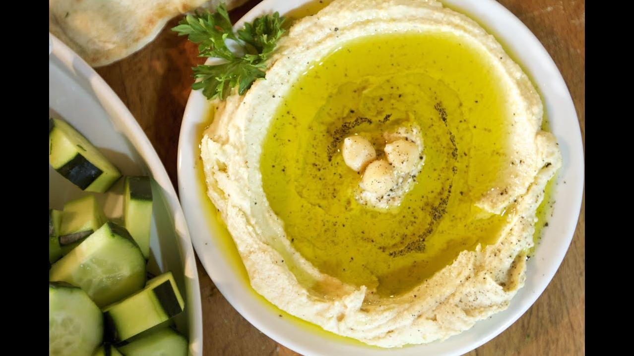  A drizzle of extra-virgin olive oil adds a touch of richness to the hummus.