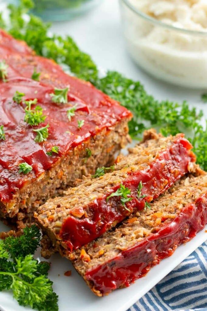  A slice of this vegan lentil loaf topped with rich gravy and served with mashed potatoes is what comfort food dreams are made of.