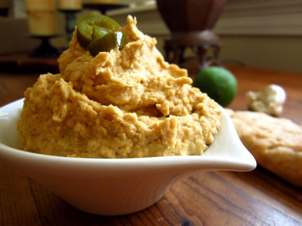  Add some zest to your snack game with this flavorful hummus.