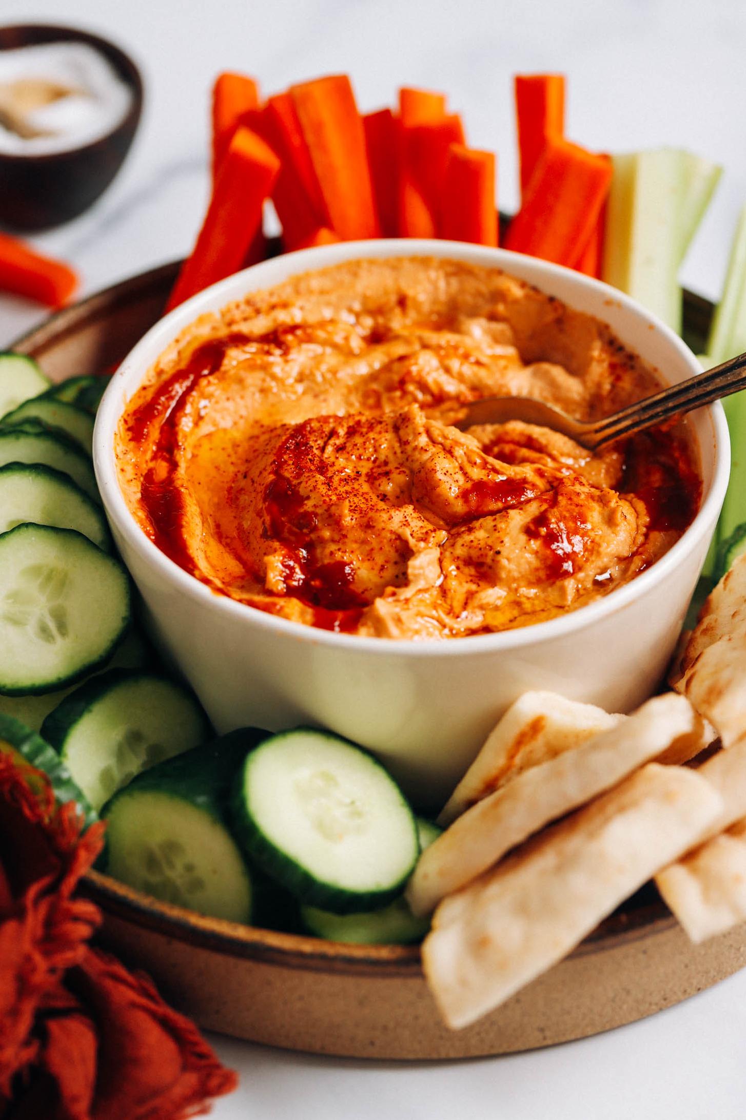  Chickpeas, tahini, and chipotle peppers in adobo sauce come together to create this delicious dip.