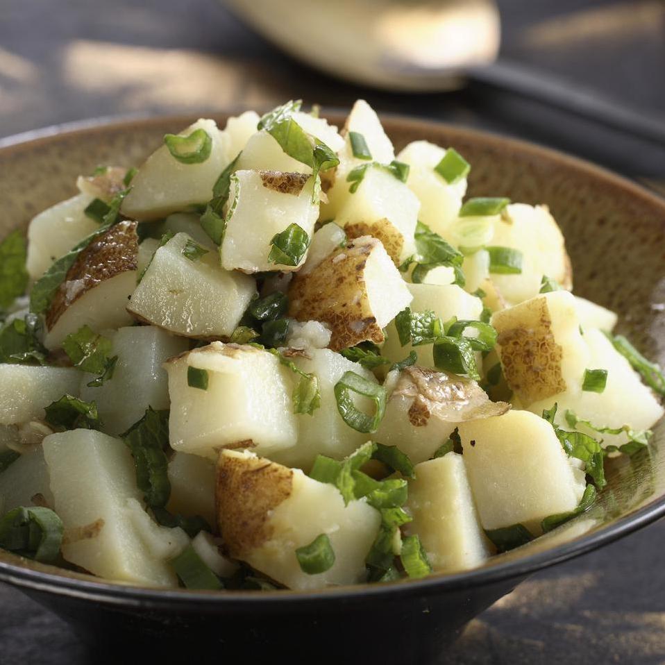 Chunky potatoes dressed in a zesty Lebanese-style dressing.