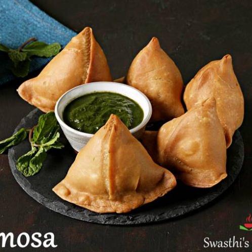  Fall in love with the golden-brown color of these perfectly fried samosas.