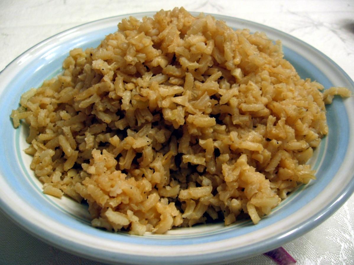  Fragrant brown rice pilaf served with warm poached chicken