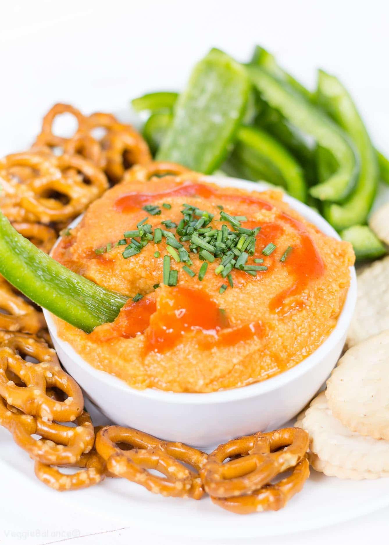  Get ready to dip into perfection with this tasty Buffalo Hummus.