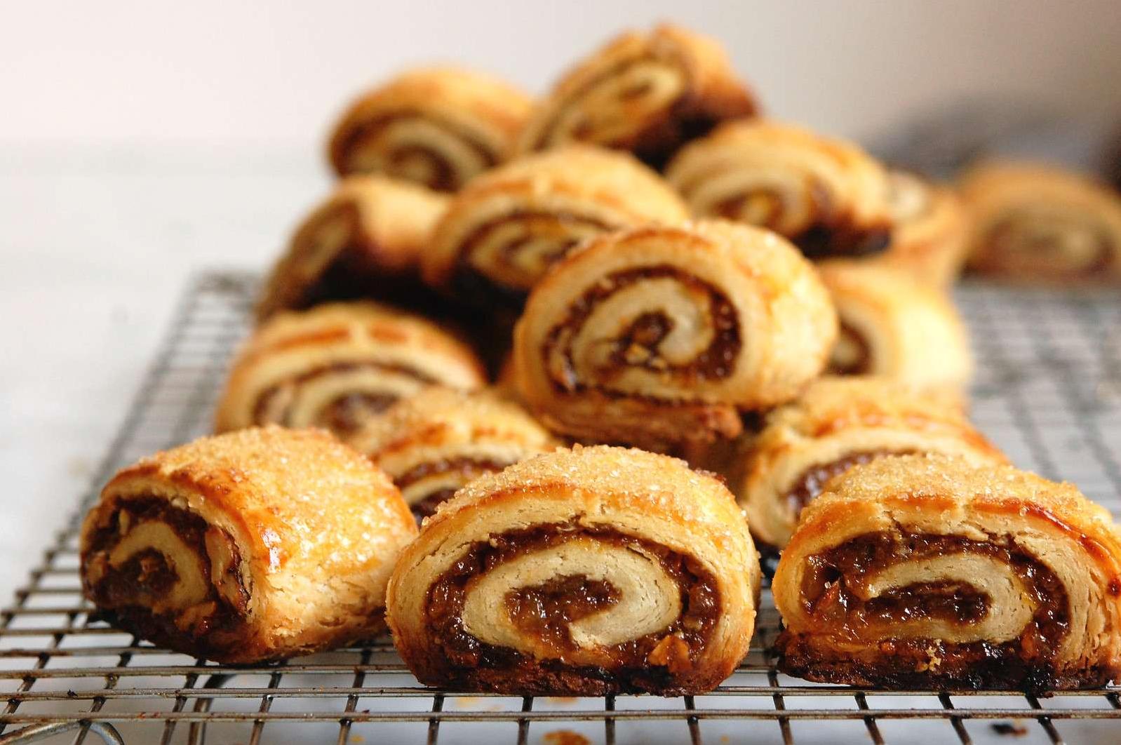  Golden brown and dusted with cinnamon sugar, these Rugelach triangles are a treat for the eyes and taste buds.