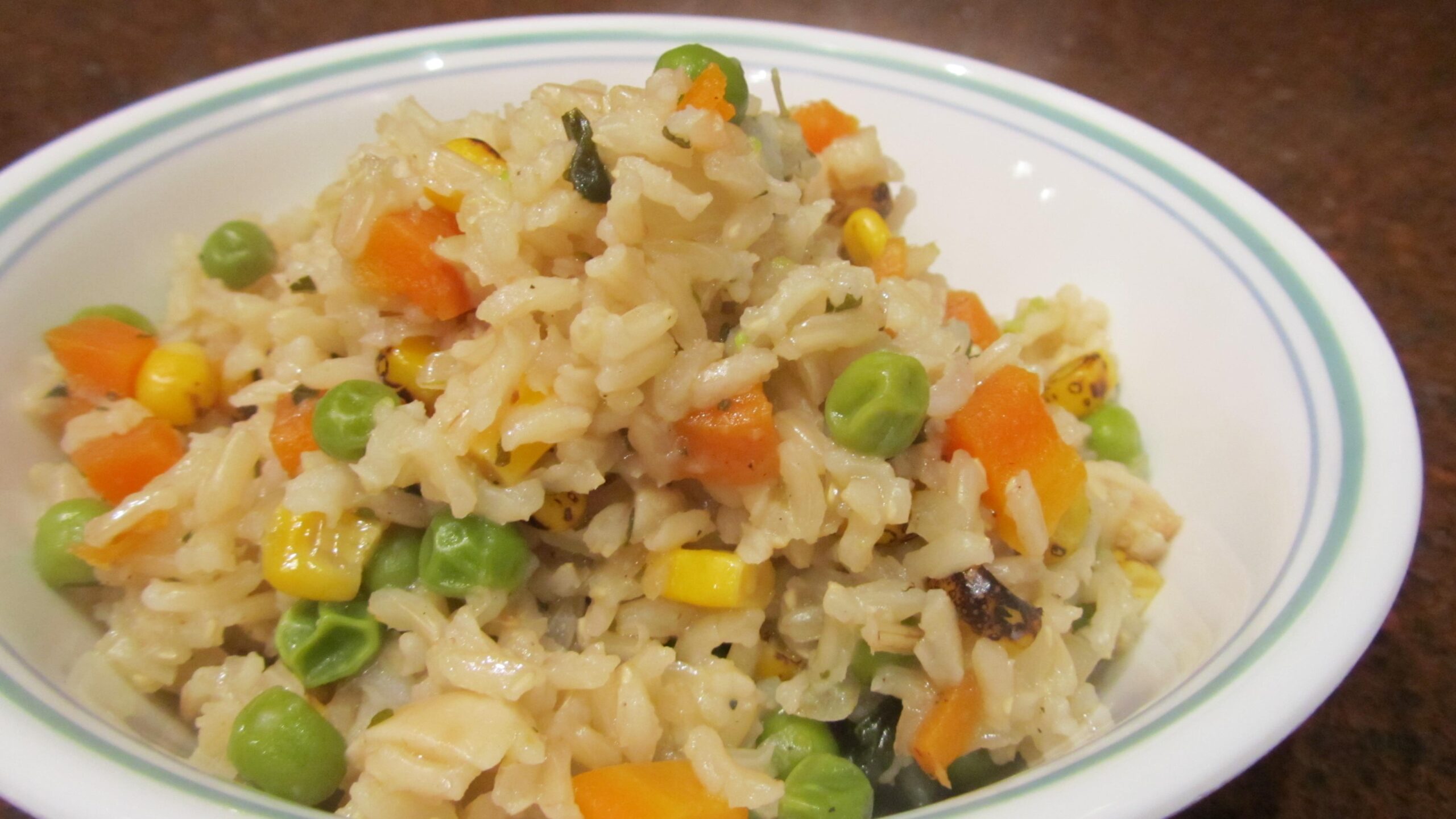  Perfectly cooked grains of brown rice combine with tender bits of carrot and savory diced onion in this comforting pilaf.