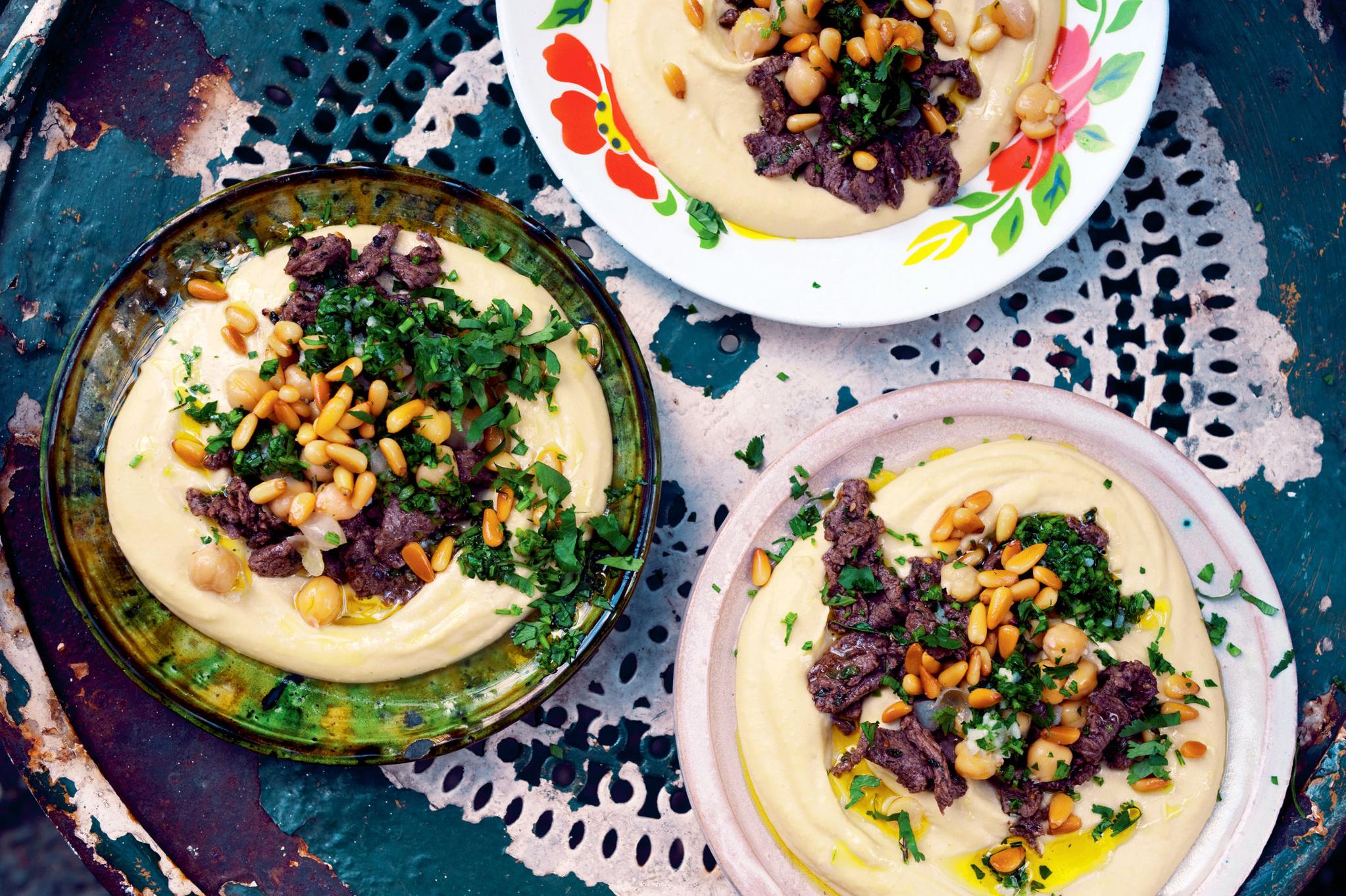  Soft and fluffy pita bread served alongside homemade hummus is the perfect combination.