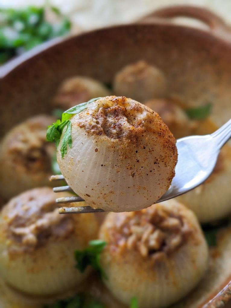  Take a peek inside the onion, revealing the savory filling that