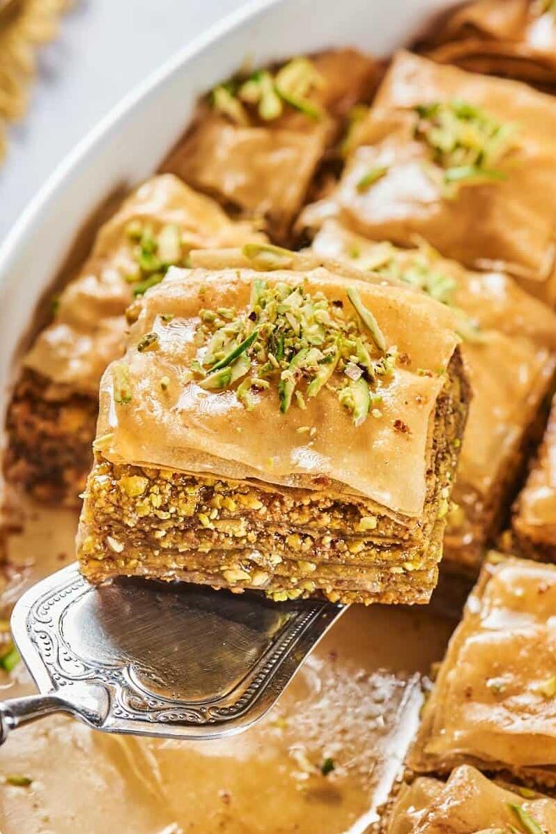  The aroma of the freshly baked baklava wafting through the air, making it impossible to resist indulging.