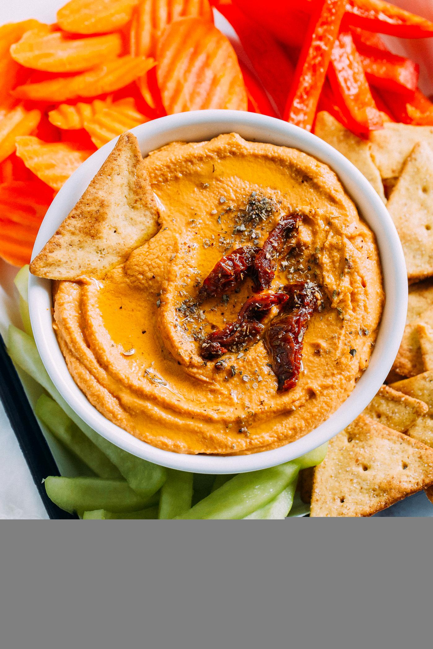  The bright-orange hue of this hummus reminds us of a stunning summer sunrise.