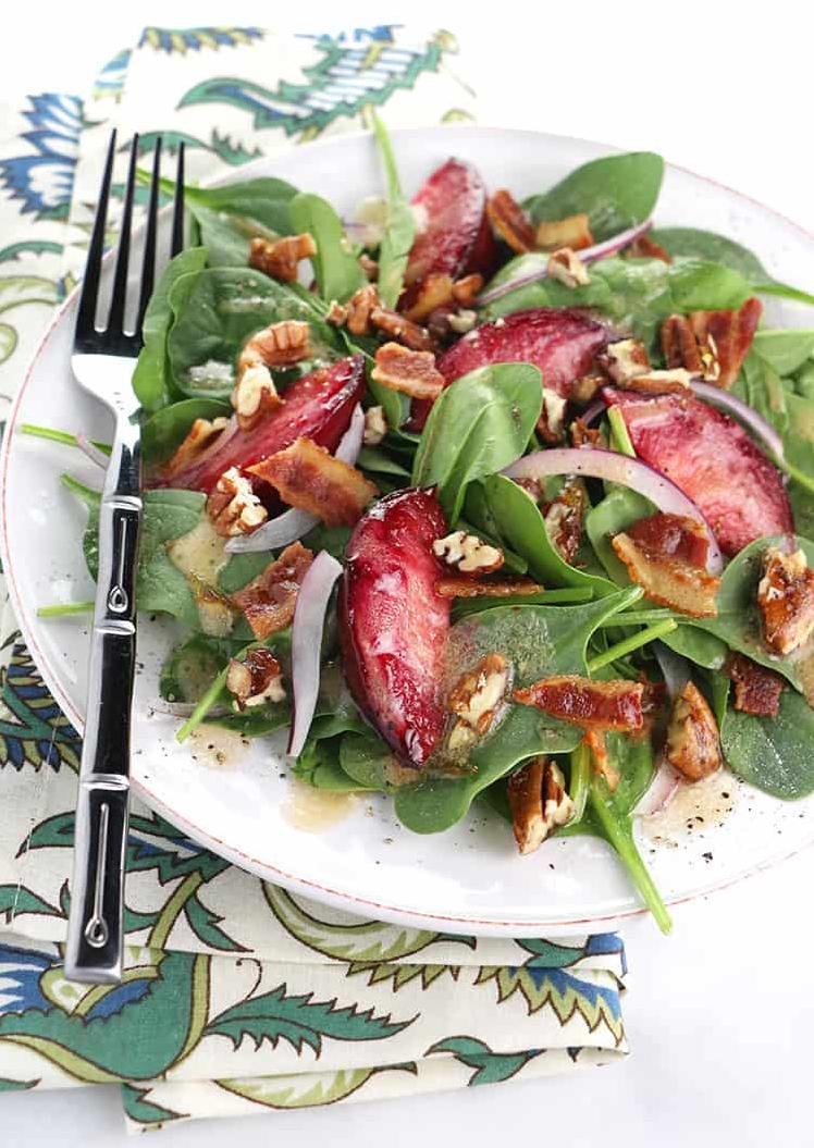  The juicy sweetness of plums with the earthiness of spinach make a delightful combo.