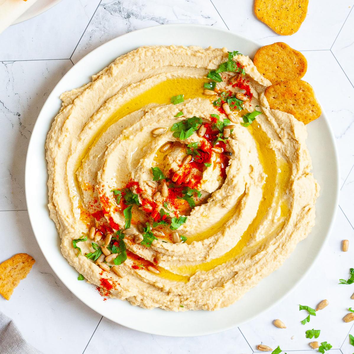  The perfect balance of tangy and nutty flavors make this Sprouted Sunflower Seed Hummus so addictive.
