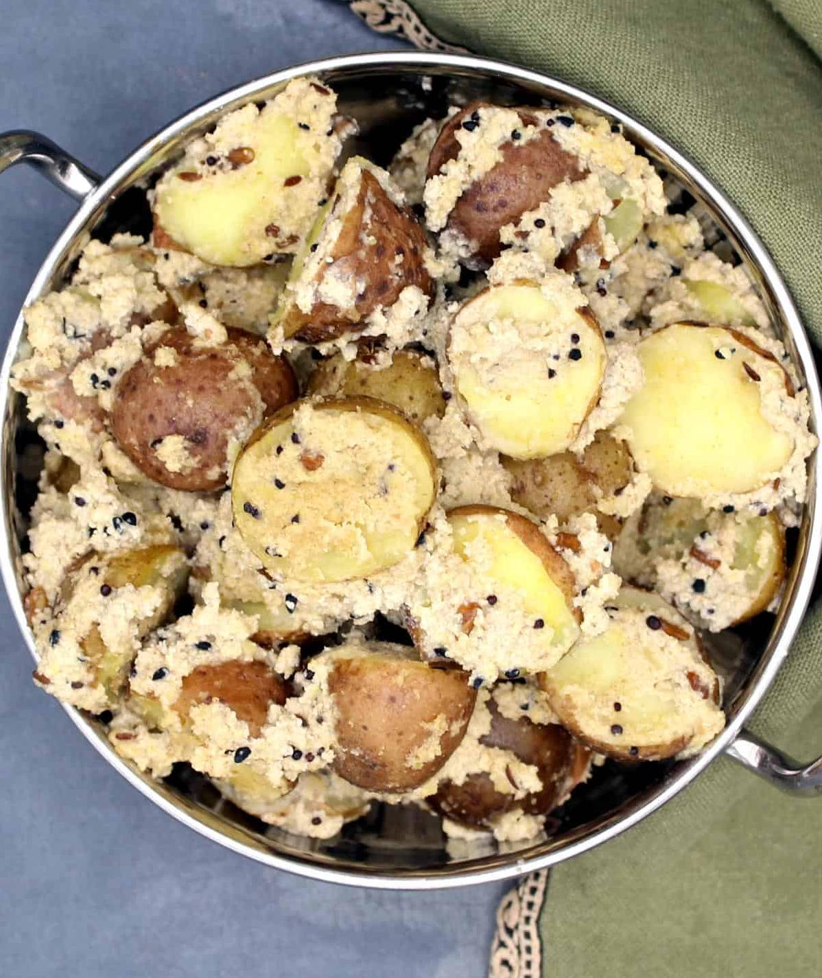  These golden, crispy potatoes are perfectly coated in a rich poppy seed sauce.